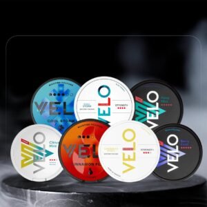 A selection of VELO nicotine pouch cans in various colors representing different flavors.